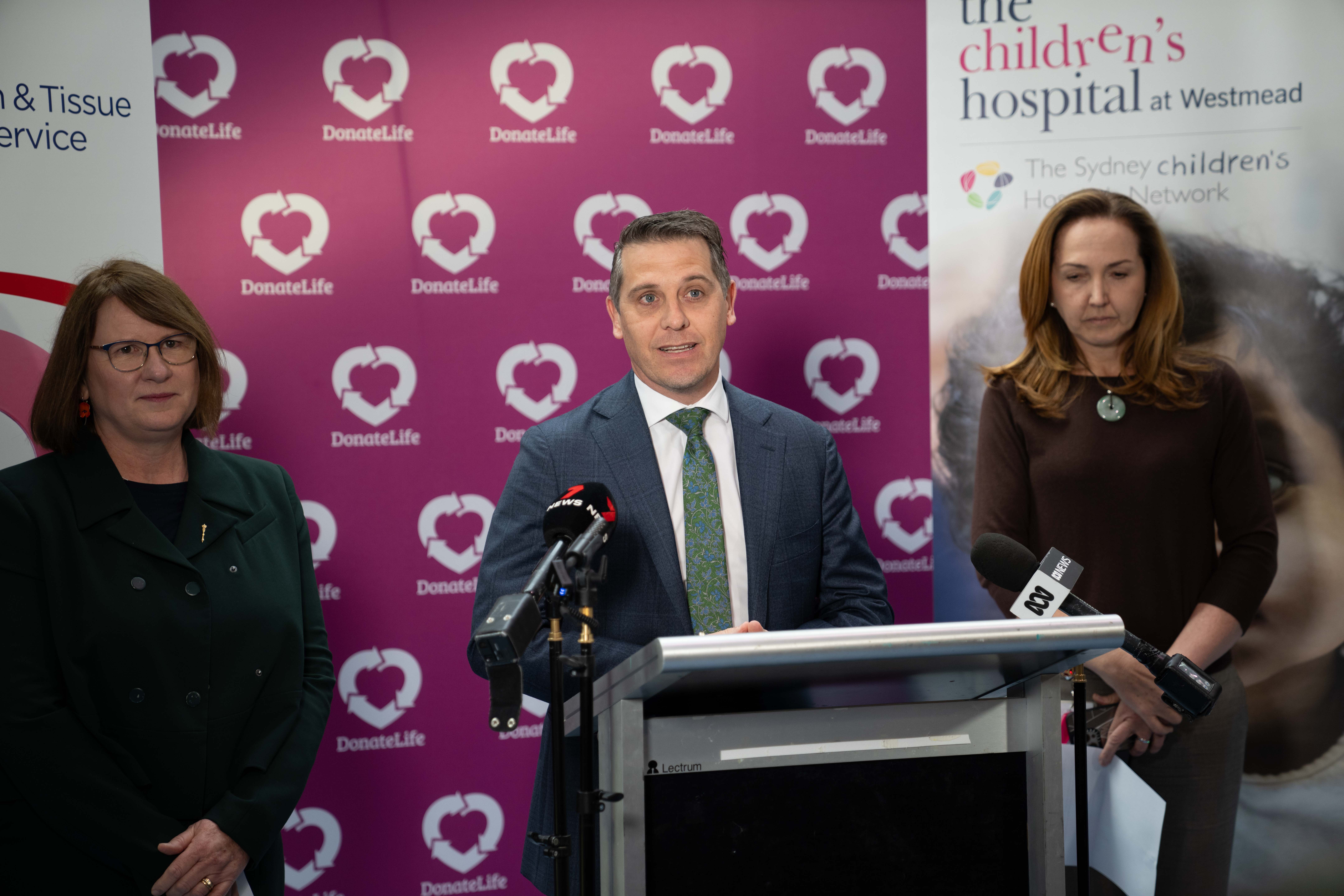 Hon. Ryan Park MP and two others at a podium during the DonateLife Week press conference at The Children’s Hospital at Westmead.