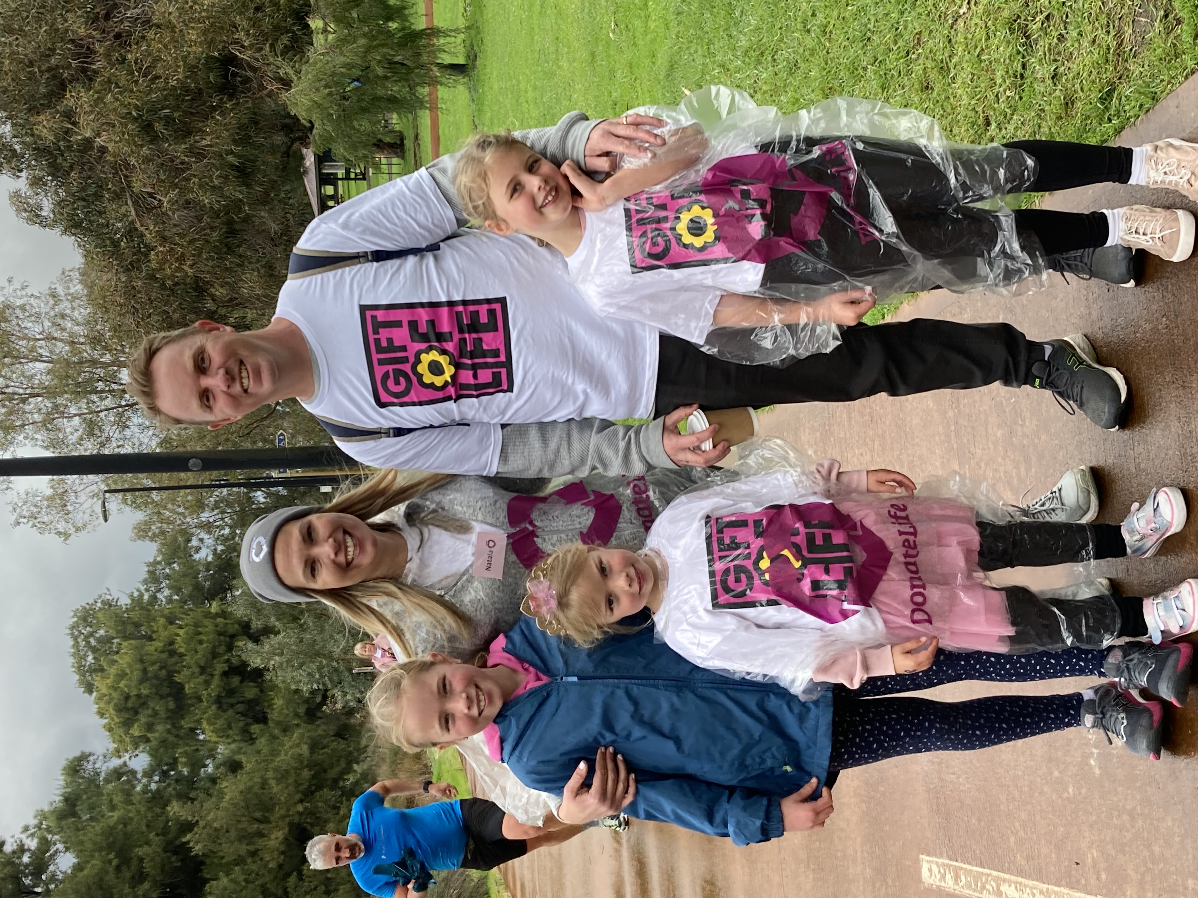 A family post for a photo on the walking track during the Gift of Life Walk.