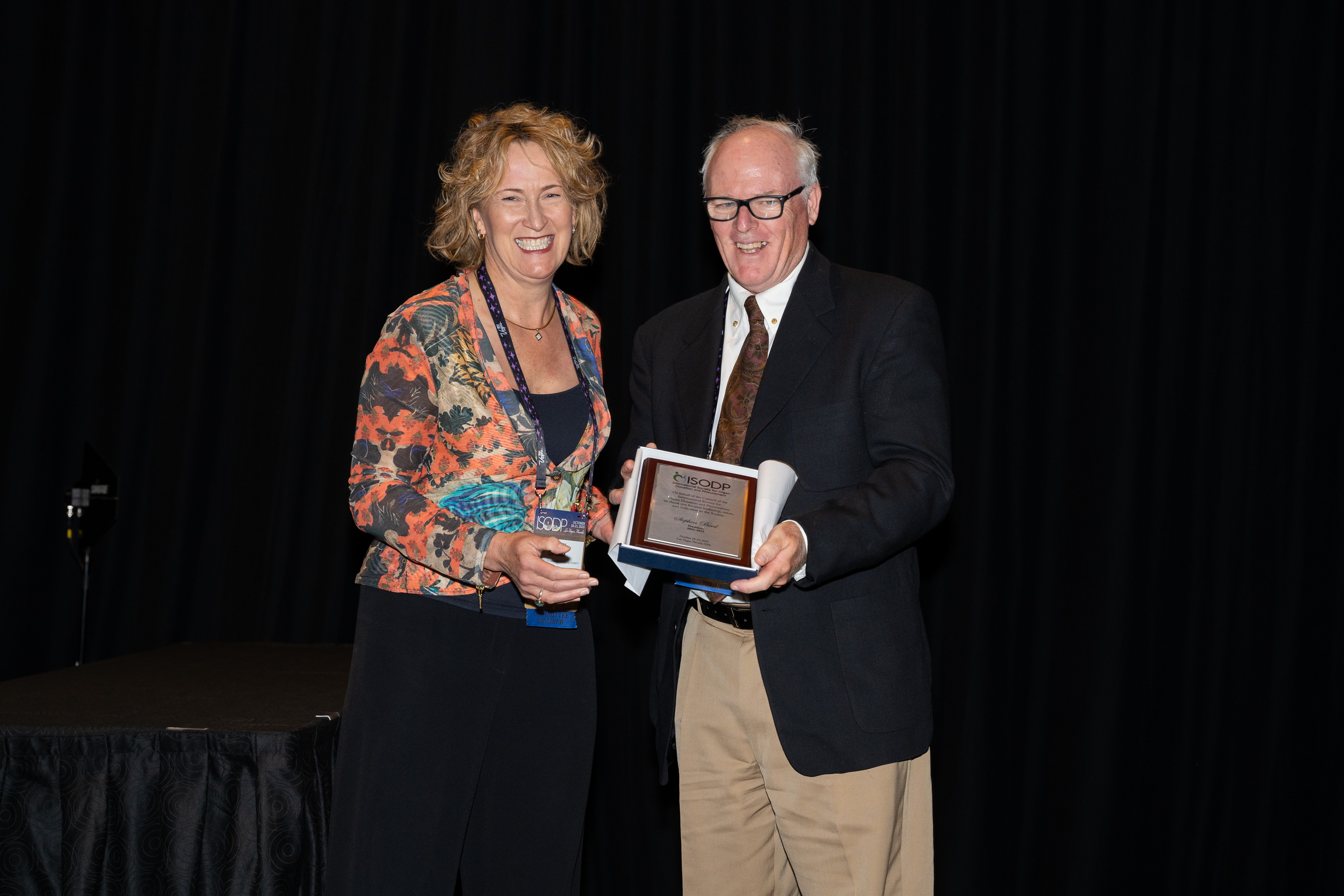 A photo of Helen Opdam and past ISODP president, Stephen Beed. 