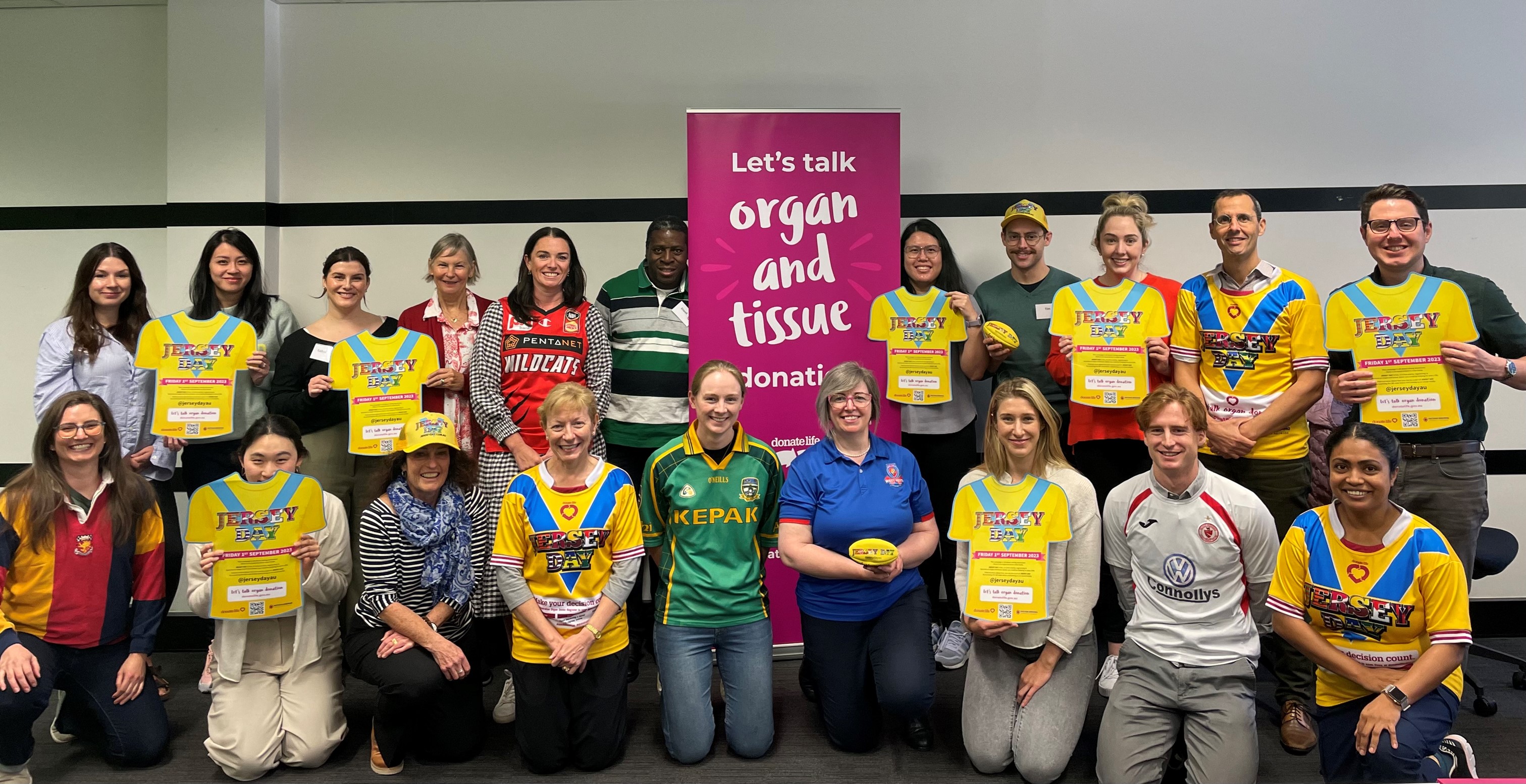 Staff wearing their Jersey Day jerseys 