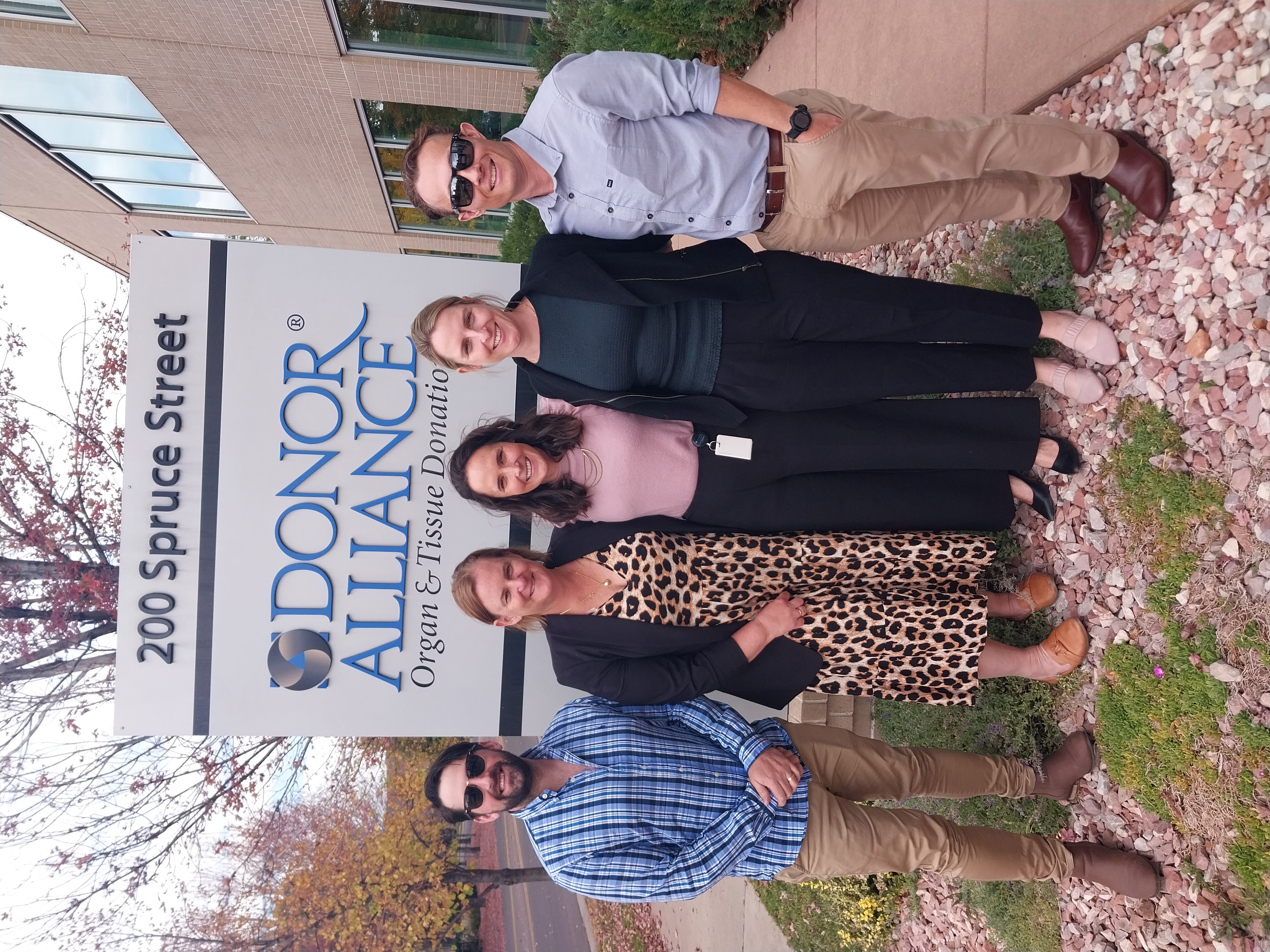 NSW Organ and Tissue Donation Network staff stand for a group shot in front of the Donor Alliance in the USA.