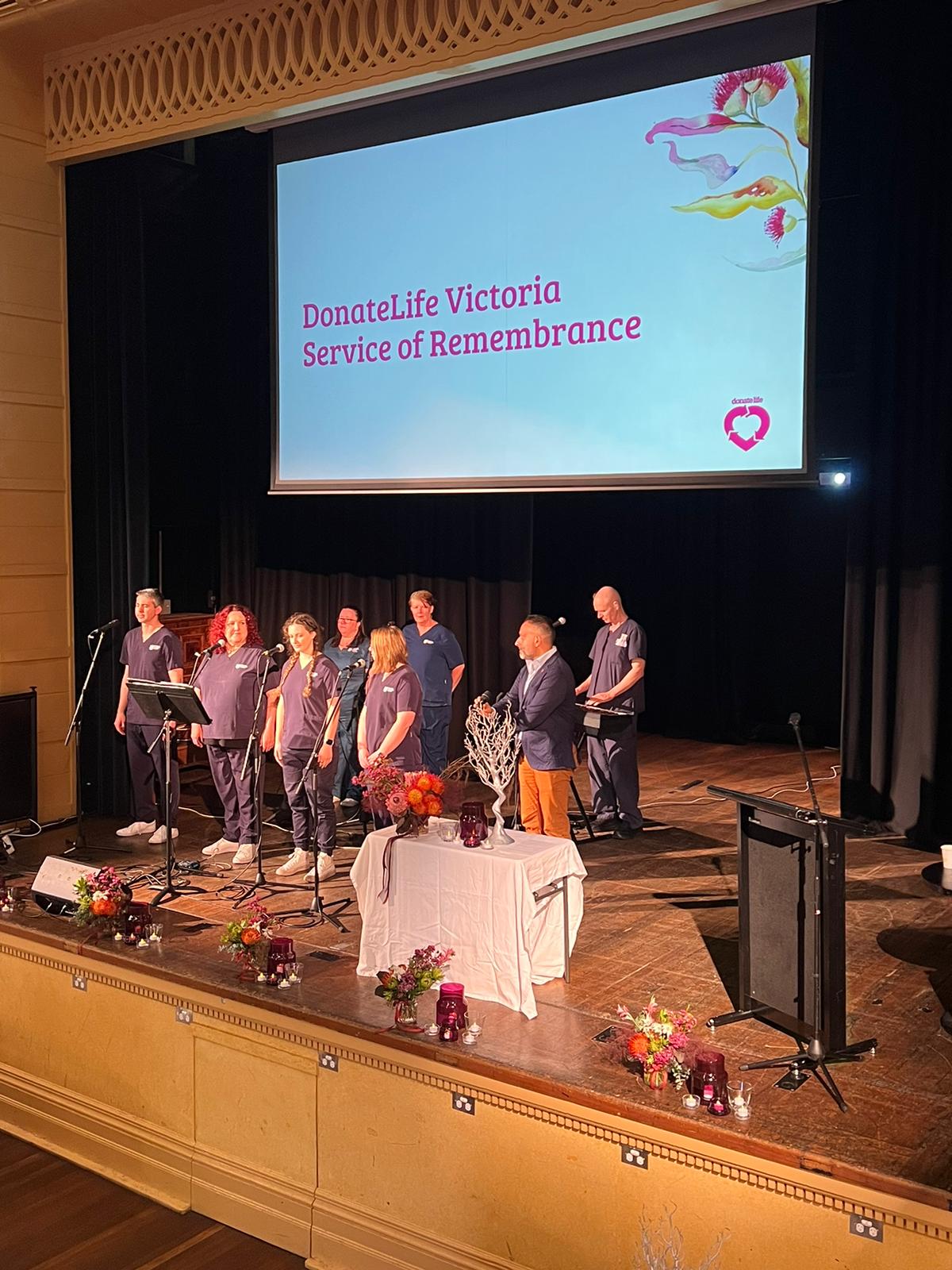 A choir performs at the VIC Service of Remembrance. 