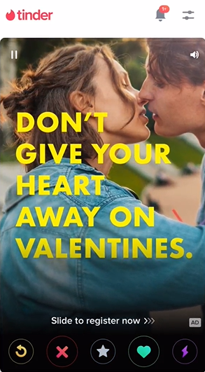 Screenshots of an ad on the Tinder app, with the tagline ‘Don’t give your heart away on Valentines. We need it more.’